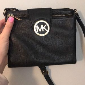 MK black leather satchel